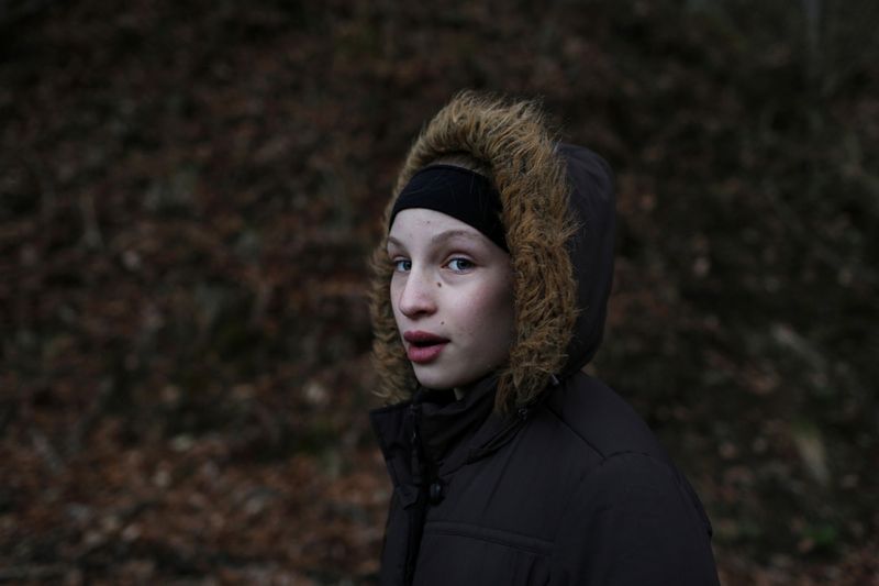 © Maddie Mcgarvey - Sonya, now 13, takes a walk near her grandparent's home.