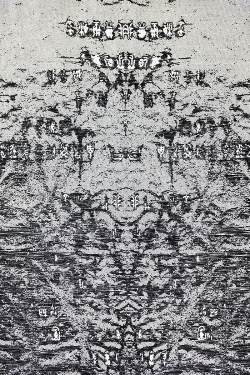 © Yujie Zhou - Save as Text —The Whistle-Giver in Oracle Bone Script2023, Jacquard Weave, Wool and Cotton, 260 x 110 cm.