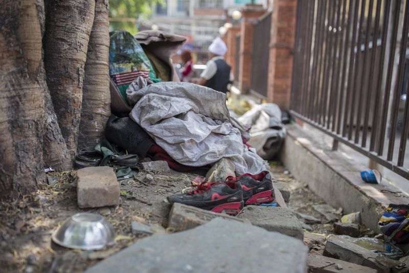 © Heidi Wentworth-Ping - A park in Thamale where the boys from the area sleep.