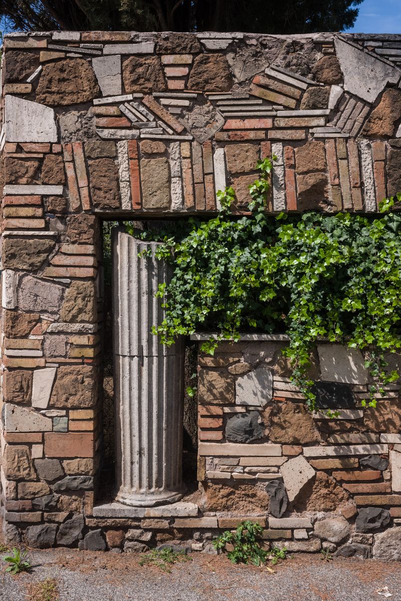 © Clelia Carbonari - Roman column inserted into the border wall of a private house, Acilia.