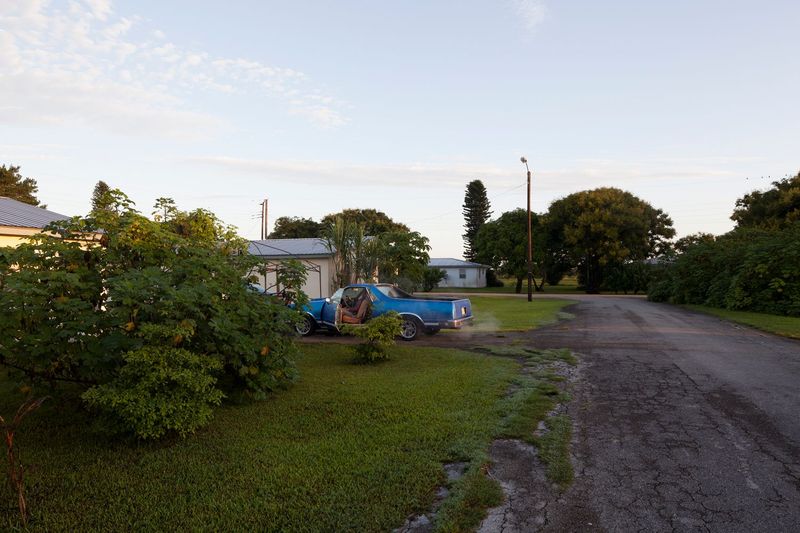 © Sofia Valiente - Gene starting up his El Camino on a morning in the village.