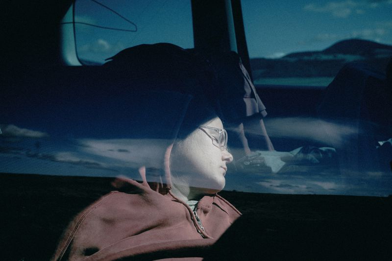 © Hana Selena Sokolovic - My sister sleeping in the car during our journey — somewhere in Bosnia, 2024.