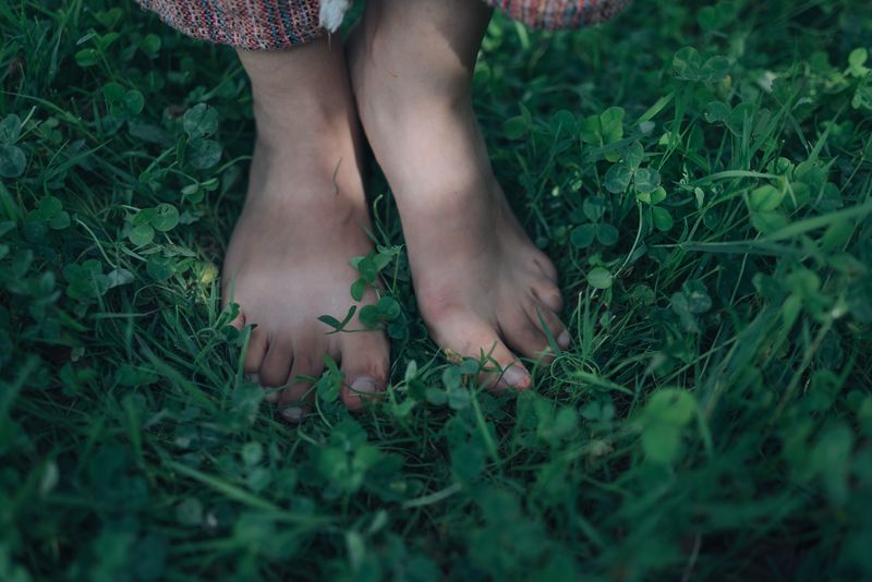 © Kseniia Apresian - One of the volunteers walking barefoot to take a dip in the river in Gaia Terra