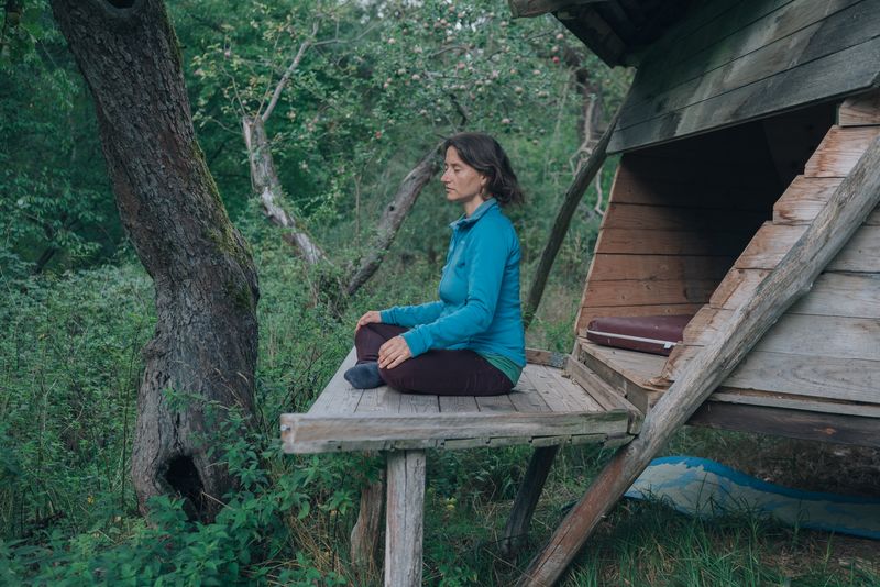 © Kseniia Apresian - Alicia meditating in a special wooden house in Zegg