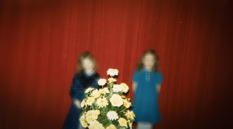 © Elizabeth Blom - red curtains,blue dresses