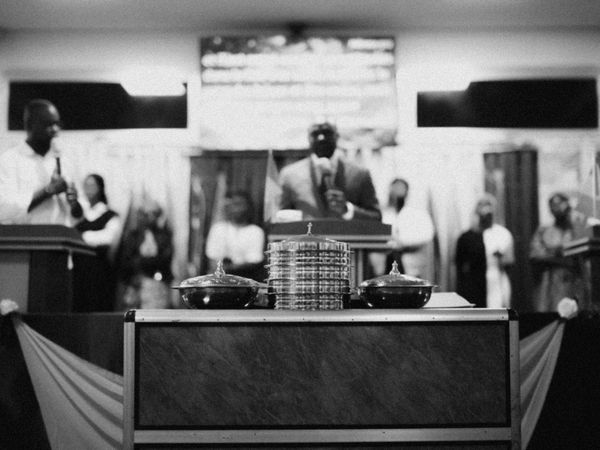 © Jeff Tidwell - A local pastor prepares the congregation for communion at a service held before the ministry team was sent out.