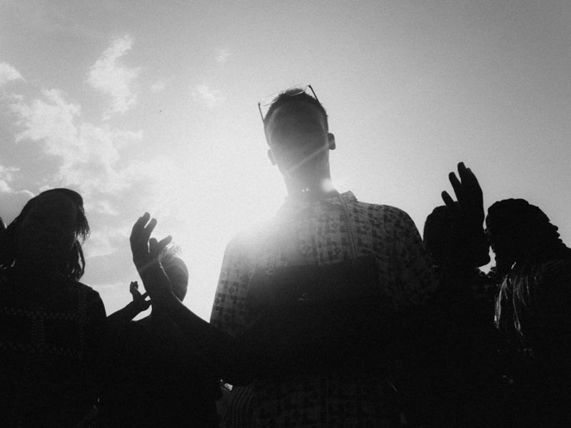 © Jeff Tidwell - A ministry team member from a local church worships during one of the team outreaches.