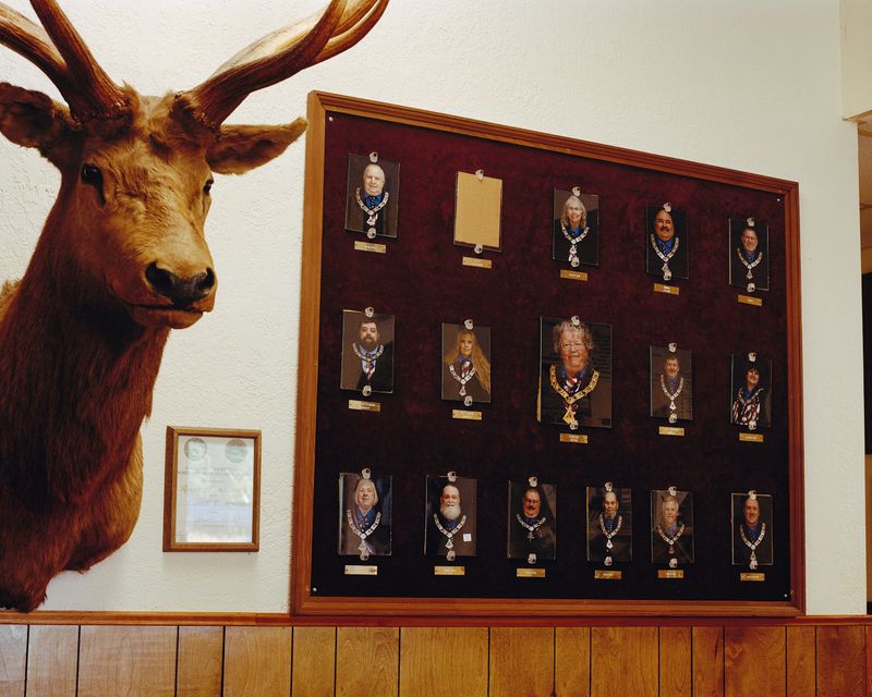 © Marco Waldis - The entrance hall of the Elks Lodge, showcasing portraits of the organization’s most prominent members.