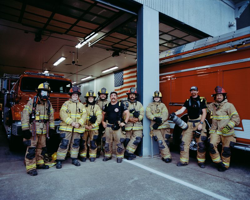 © Marco Waldis - Volunteer firefighters posing for a group shot.