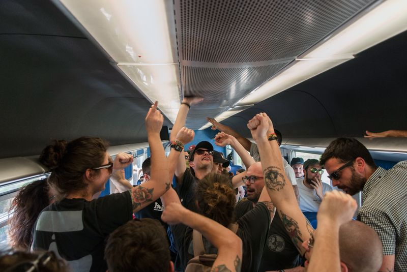 © Sara Esposito - The Ultras "Ultimi Rimasti" traveling to cheer the team.