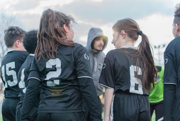 © Sara Esposito - The young soccer players, male and female, during a match.