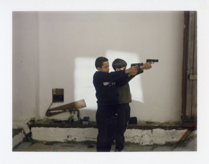 © Linda Bournane Engelberth - Children playing in the backyard
