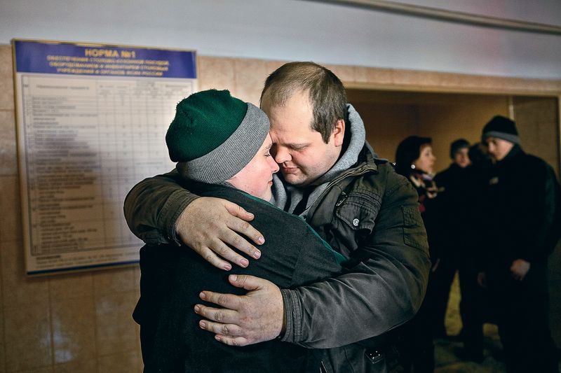 © Tatiana Bondareva - The father is bidding farewell to his son after Parents’ Day.