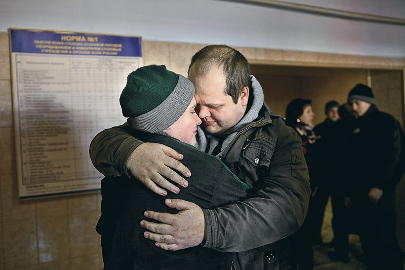 © Tatiana Bondareva - The father is bidding farewell to his son after Parents’ Day.