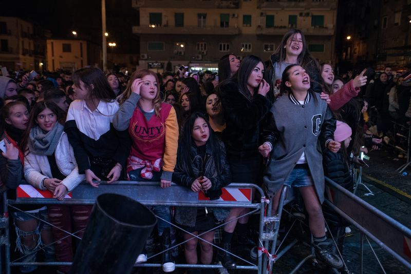 © Camillo Pasquarelli - A group of young fans during the concert for the Epiphany at Piazza Mercato, Naples.