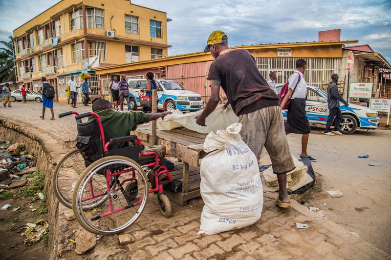 © Fabrice MBONANKIRA - November 21, 2019, Rohero (downtown), Bujumbura,BurundiDio and the person who helping him to display his goods at work.