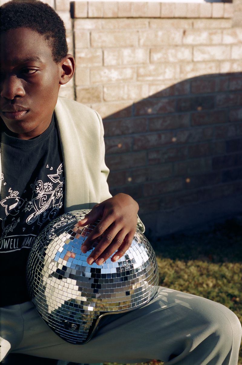 © Ozodi Onyeabor - Asher, back to reality. Asher takes off the helmet. Removed from his augmented reality and back into the real world of 2020.