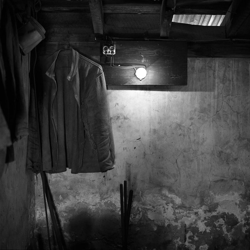 © William Mark Sommer - Last Light. Darkness reigns within the mine, start before sunrise, end after sunset, living fully within artificial light.