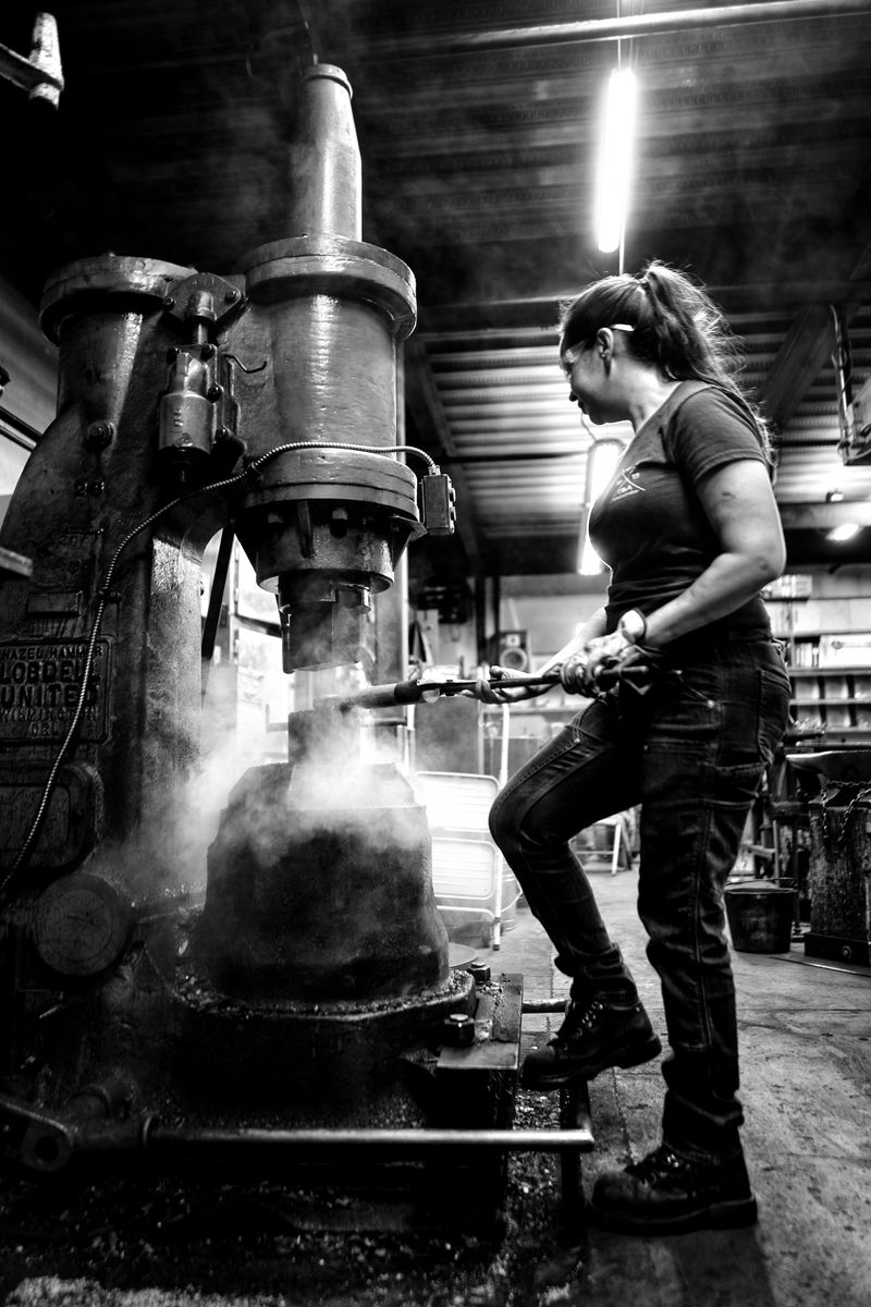 © Katerina Christina - Celeste works on a custom handrail for a Napa Valley winery, using a myriad of tools in her workshop.