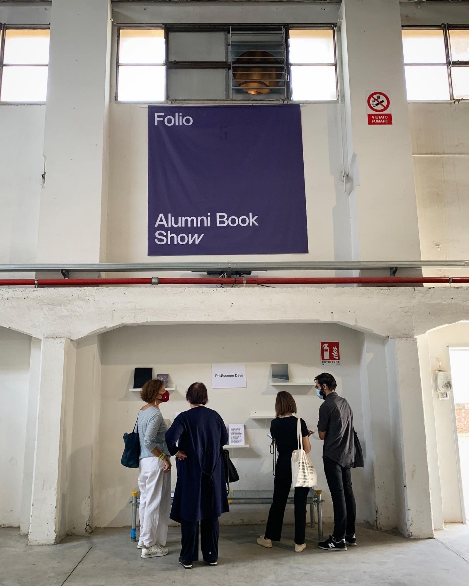 Visitors discover the books produced during PhMuseum's FOLIO masterclass © PhMuseum