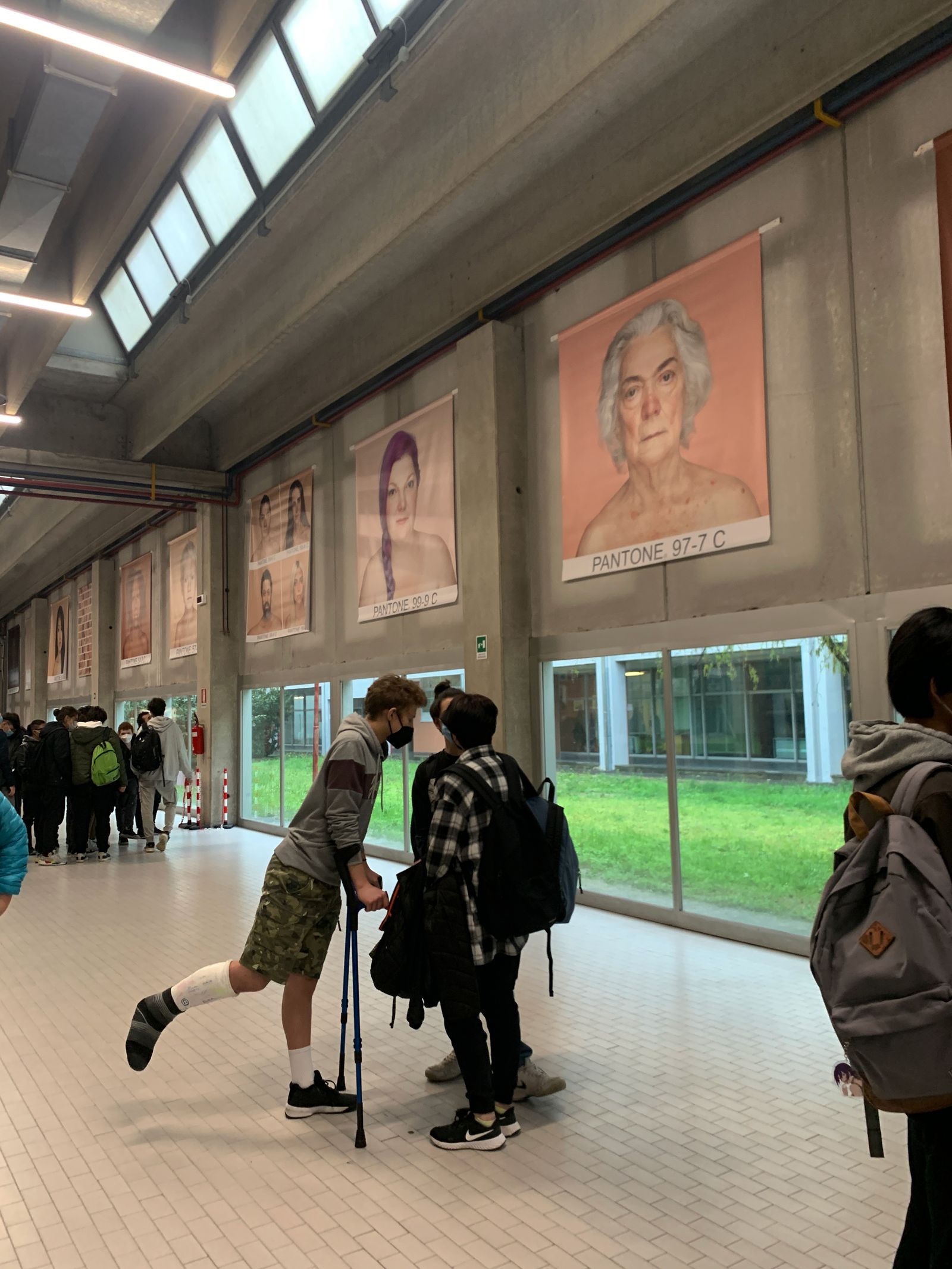 Students talk in the corridor of IIS Belluzzi Fioravanti high school in Bologna, Italy
