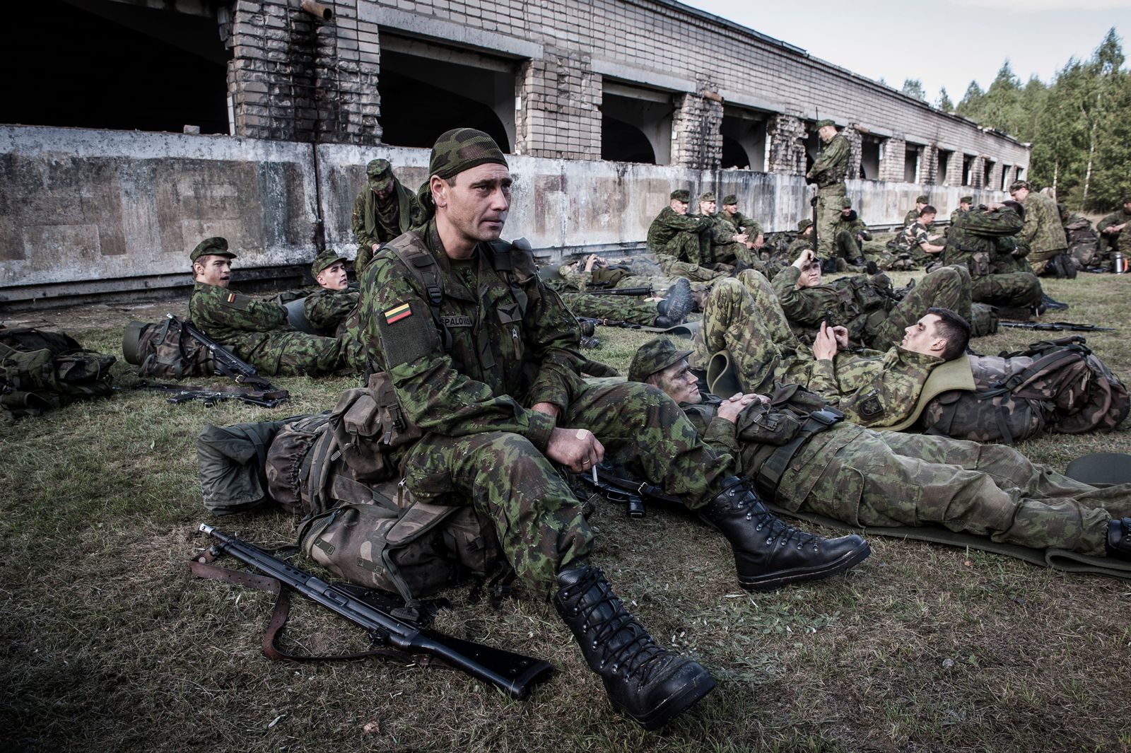 © Mattia Vacca - Young recruits rest in the surroundings of a dismantled Russian military base in the forests of Central Lithuania.