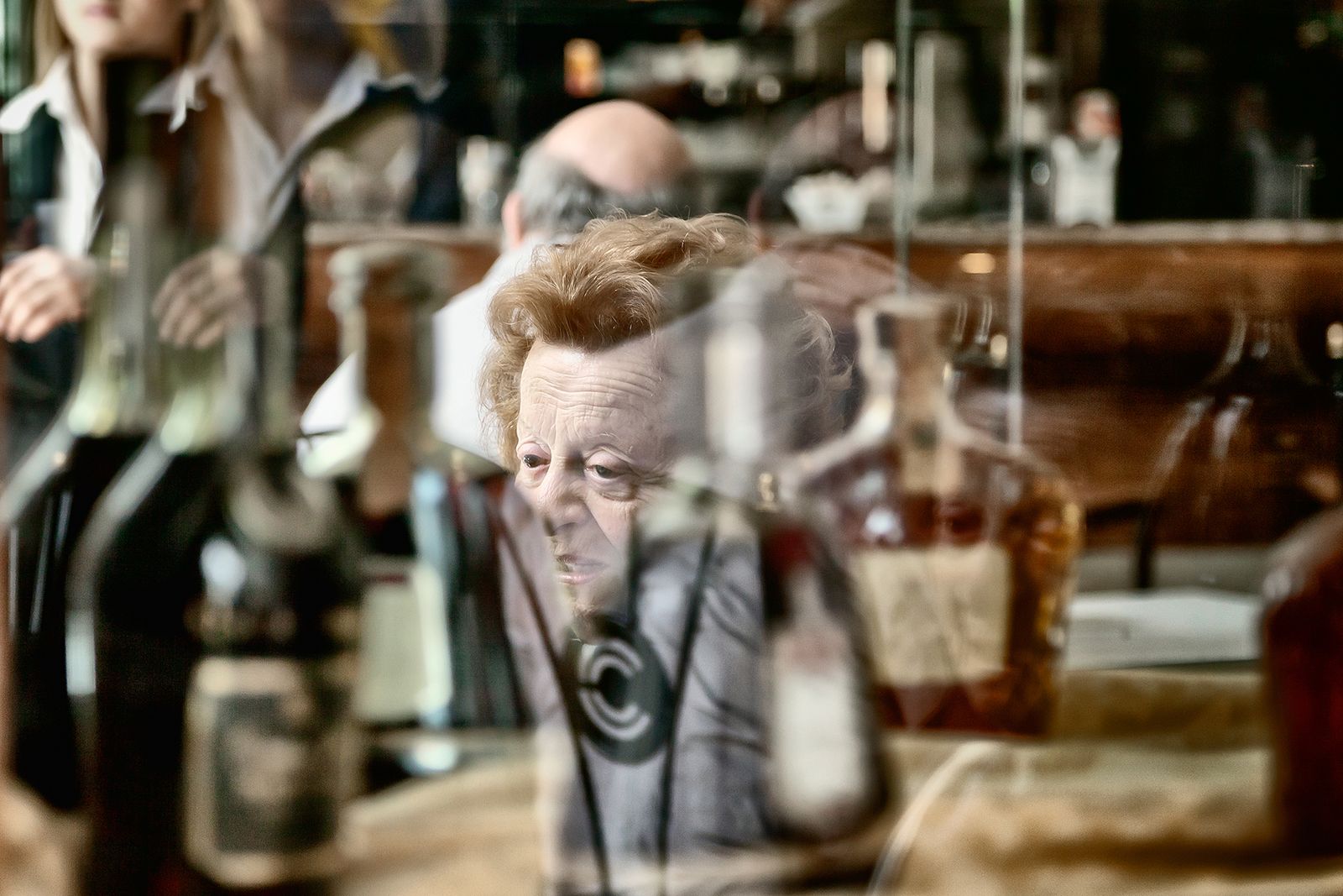 © Simona Bonanno - Aunt Sara reflected in the mirrors of her favorite spot for the morning coffee.