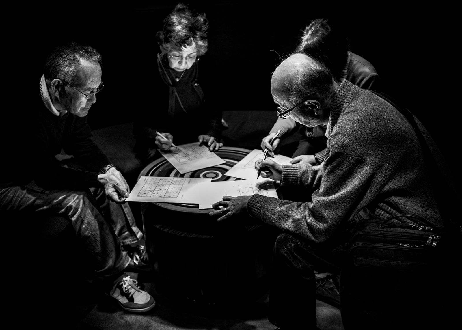 © Simona Bonanno - Passengers playing sudoku during the navigation. At sea 2017.