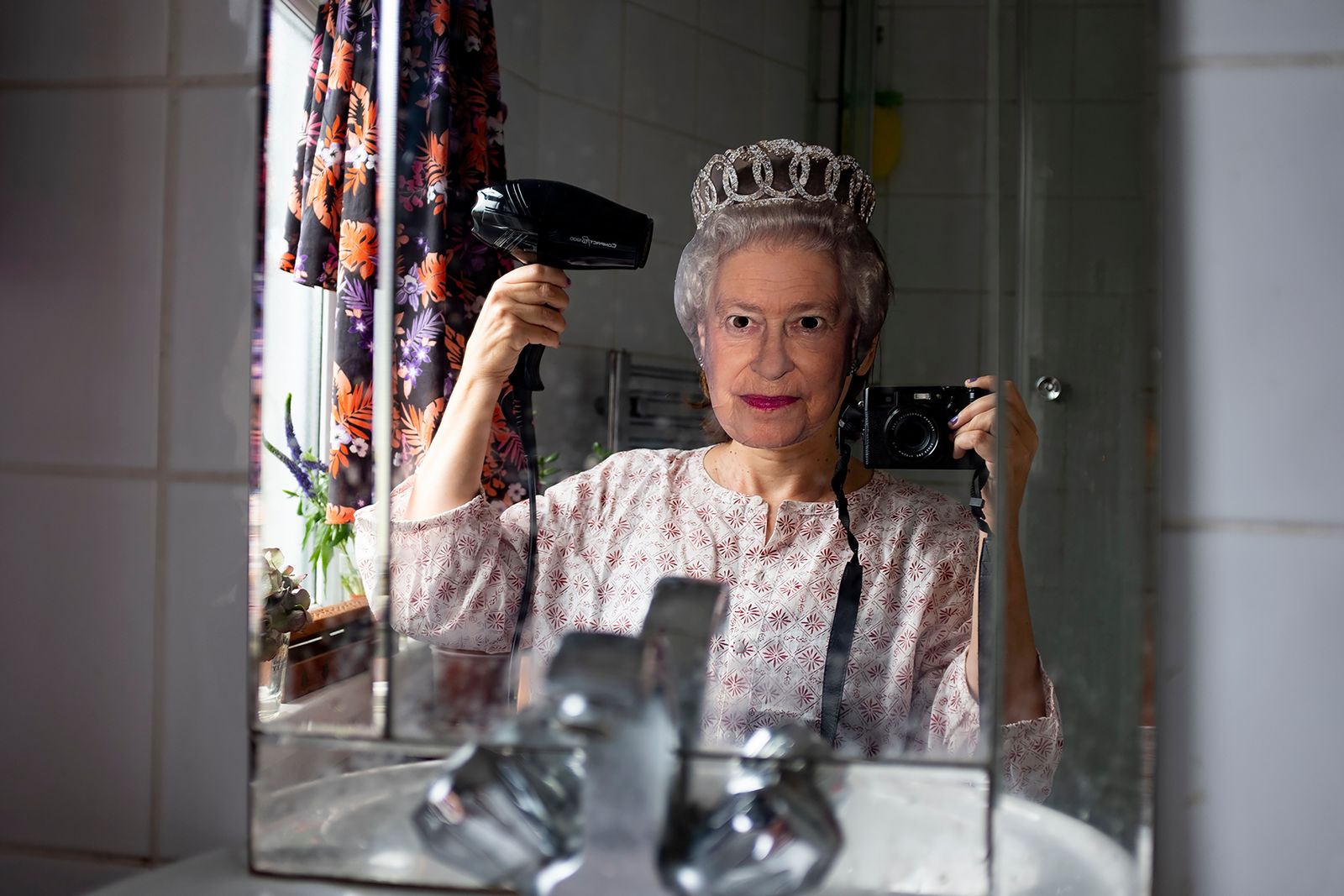 © Michela Carmazzi - "I wish I were Elizabeth in my bathroom" Self-portrait wearing a celebrity cardboard mask of Queen Elizabeth in my bathroom.