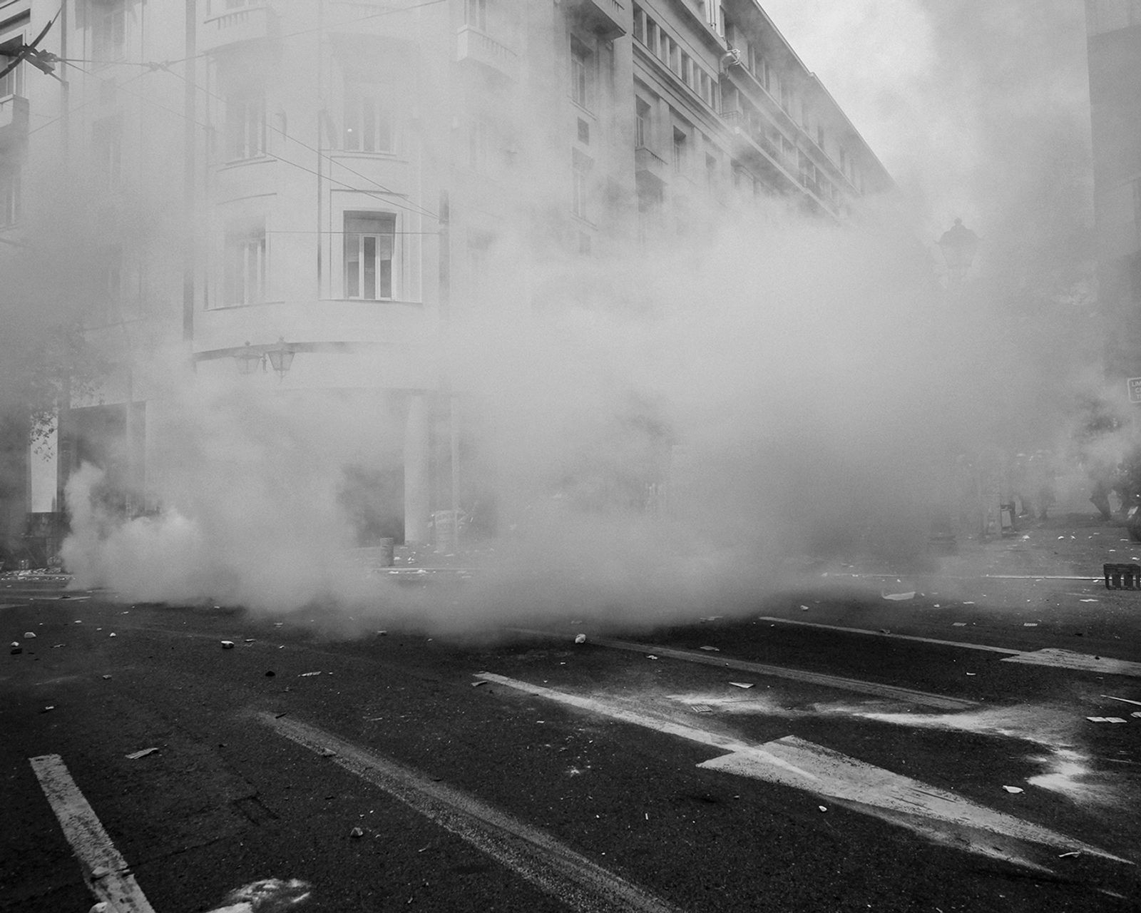 © Angelos Tzortzinis - A street scene of central Athens during clashes between demonstrators and riot police, on June 15, 2011.