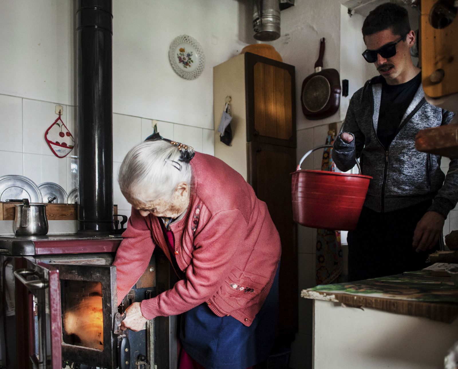 © Mattia Crocetti - Nicolas helps his grandmotherin her house, Novalesa, Italy.