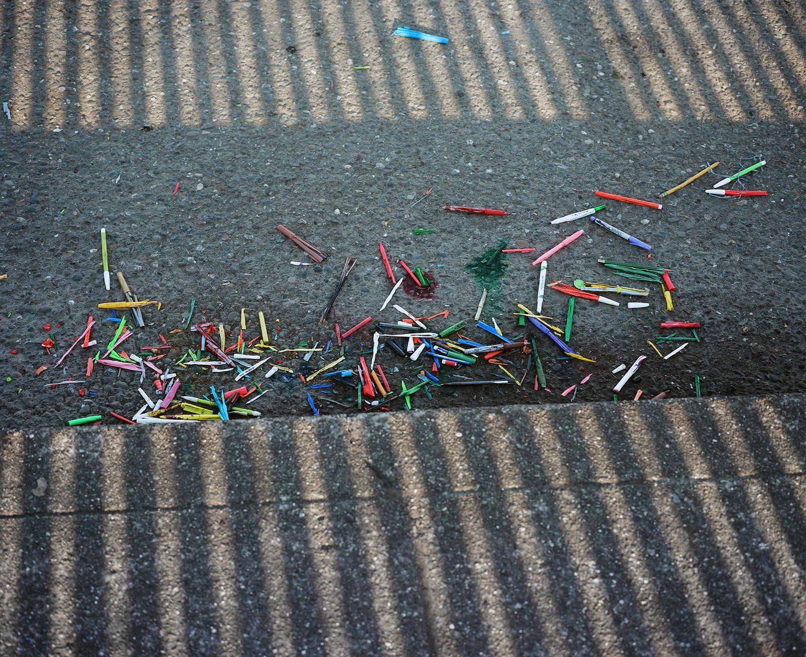 © Justin Maxon - A pile of broken pens is seen on the street after a car drove them over, in Eureka,
