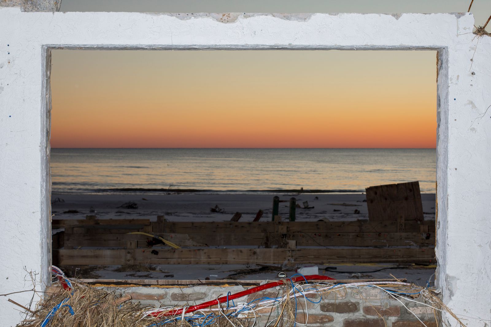© Bryan Anselm - The Gulf of Mexico seen from the structure of a destroyed home in Mexico Beach, Florida on November 16, 2018.