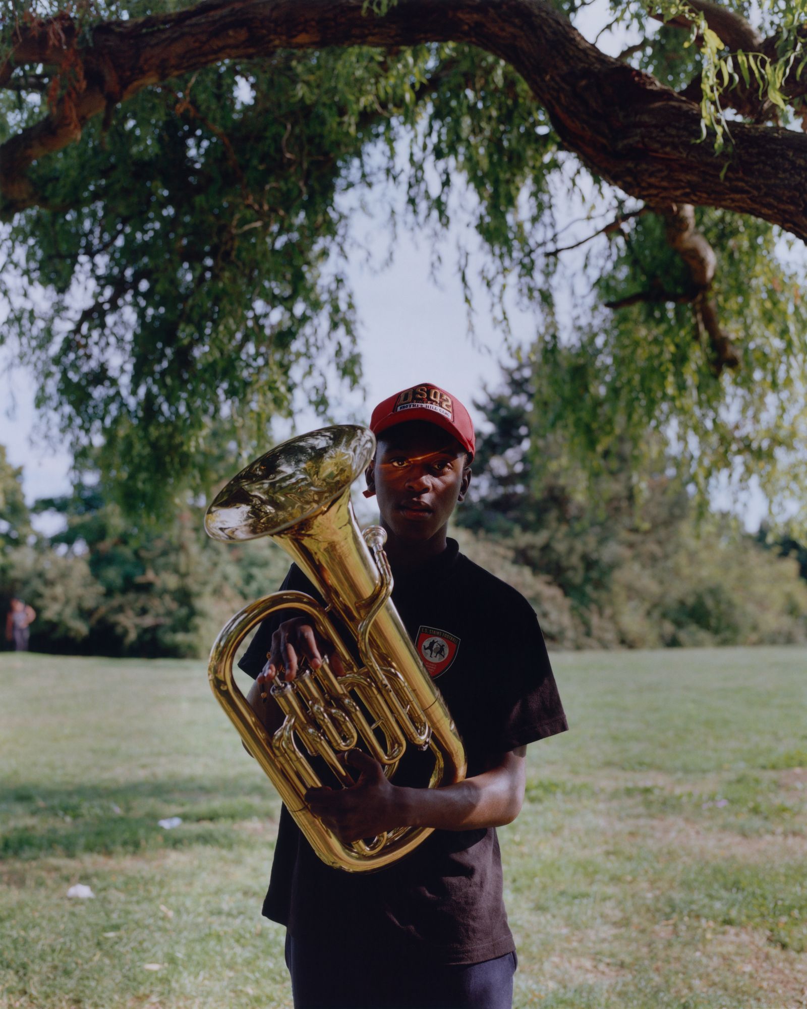 © Alexandre Silberman - Romuald, young tuba player of the kimbanguist fanfare // Georges-Valbon Park - La Courneuve // August 2019