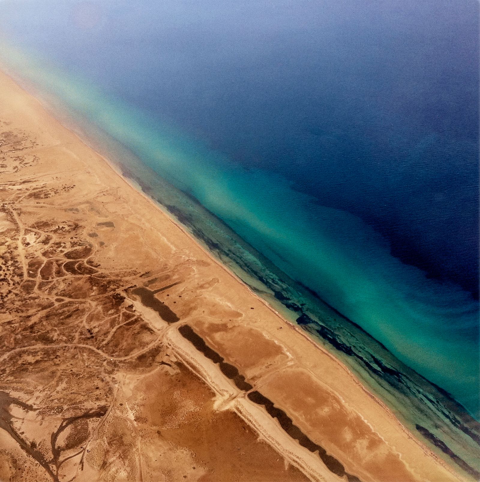 © Michael Christopher Brown. Libya. Outskirts of Benghazi. 23 October, 2011. 13:11:32. Taken from a commercial airplane.