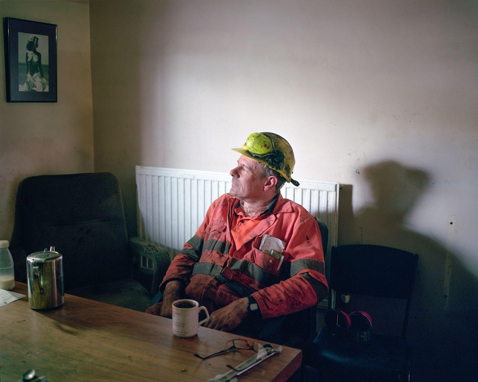 © David Severn, from the series, Thanks Maggie. A mineworker taking a tea break at Thoresby Colliery.