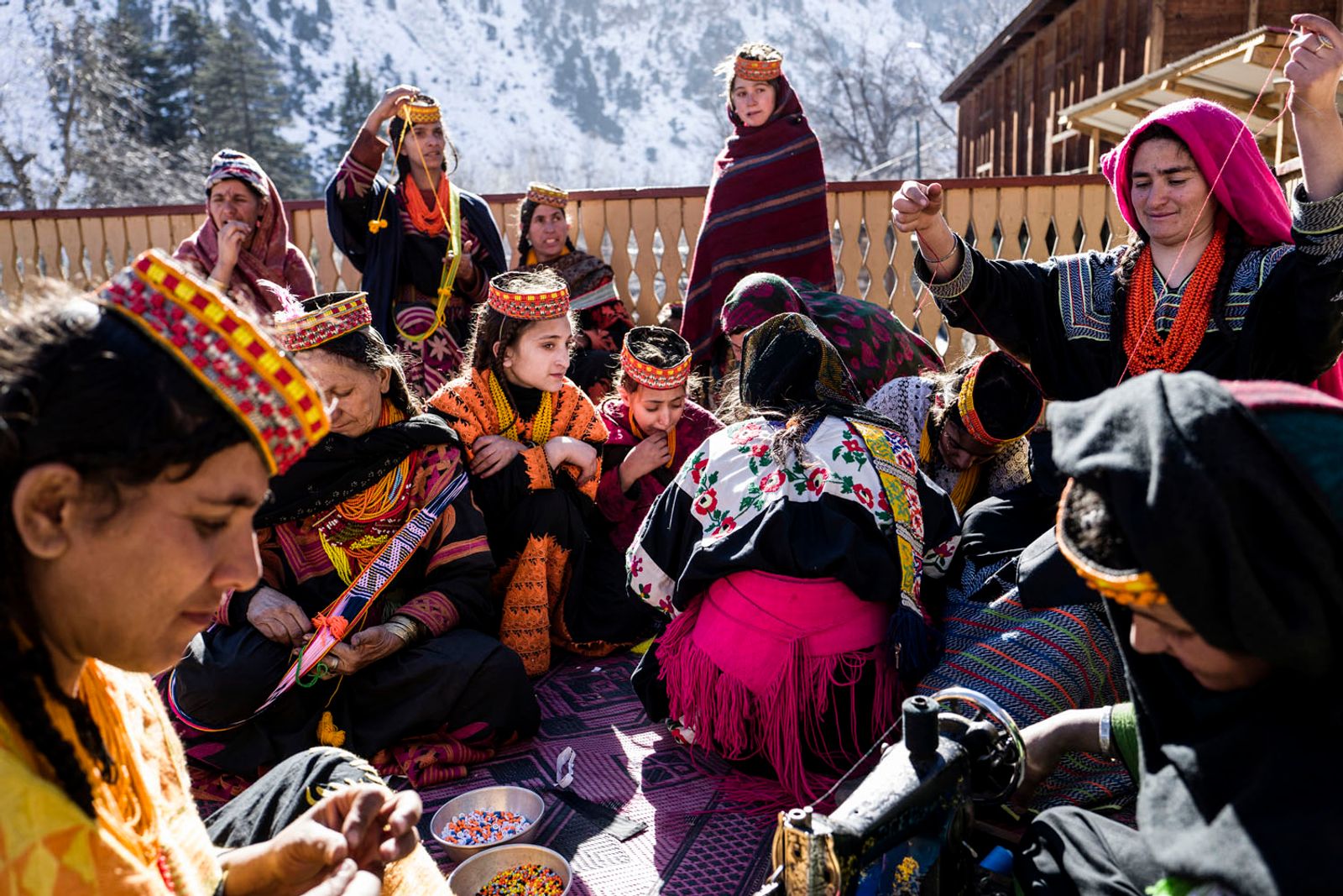 © Sarah Caron - Women benefit from daylight to do their embroidery, which is a major symbol of Kalash identity.