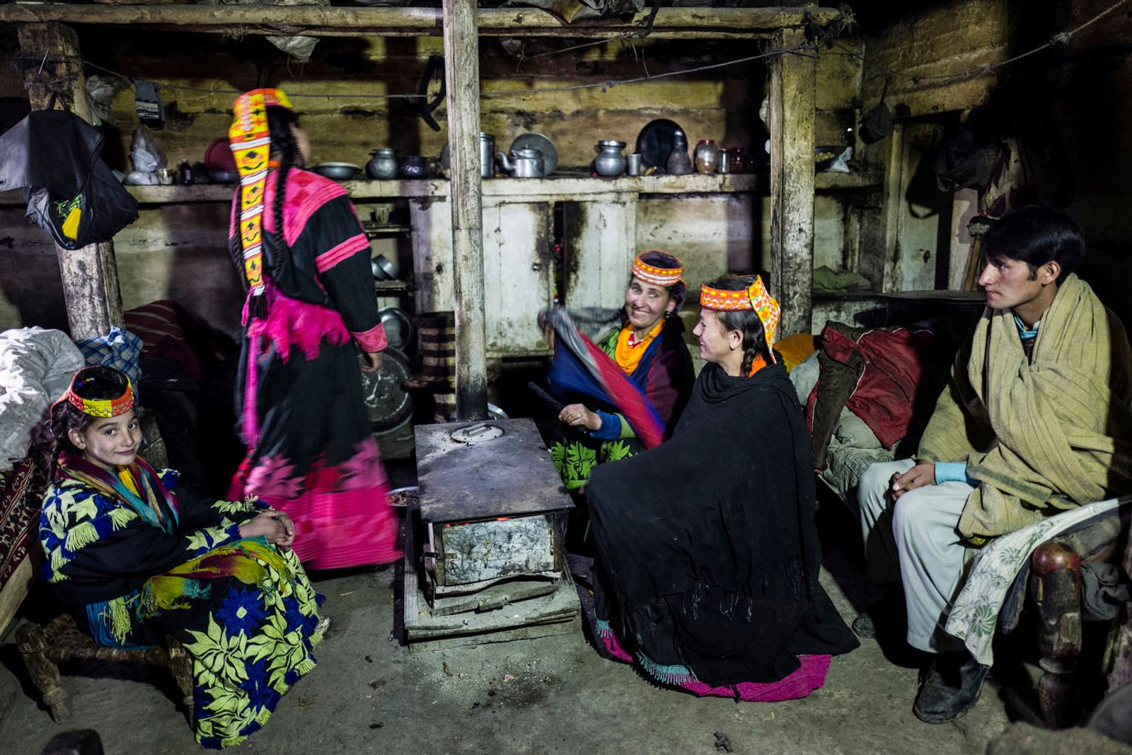 © Sarah Caron - During winter Kalash mostly stay indoors around a fire to keep themselves warm as well as for cooking.