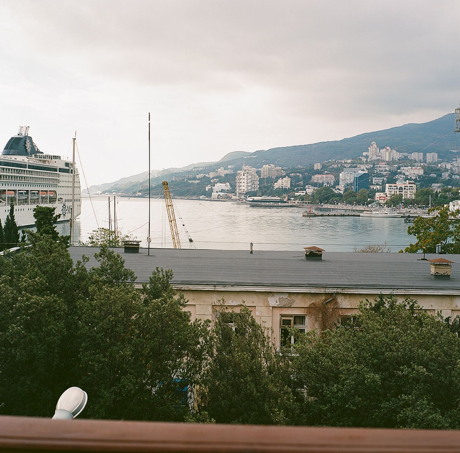 © Natalia Shlyakhovaya - The sea and the city viewed from the window of the hotel. Yalta, Crimea, Ukraine.
