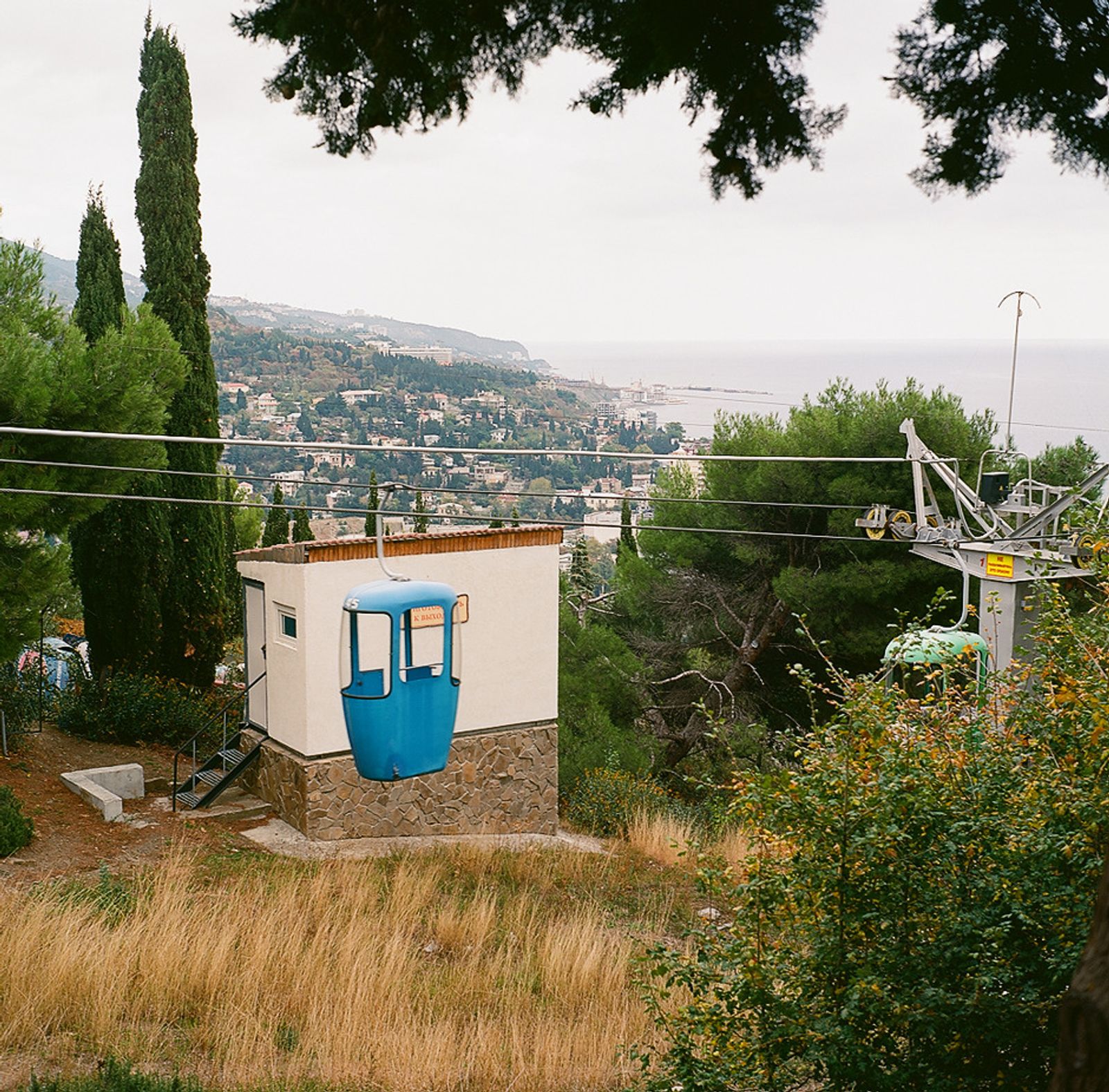 © Natalia Shlyakhovaya - The city viewed from the Cable car in Yalta. Yalta, Crimea, Ukraine.
