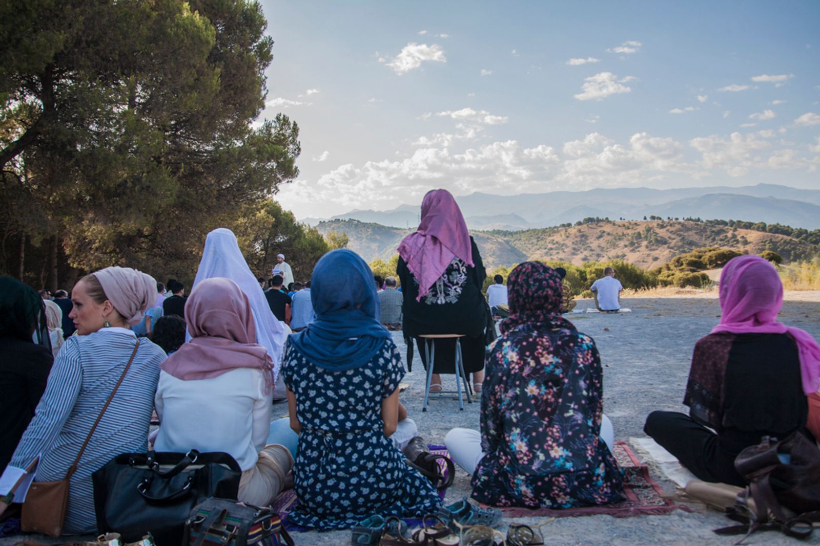 © Chiara Ferronato - Women and men pray outdoors in separate groups to celebrate the end of Ramadan.