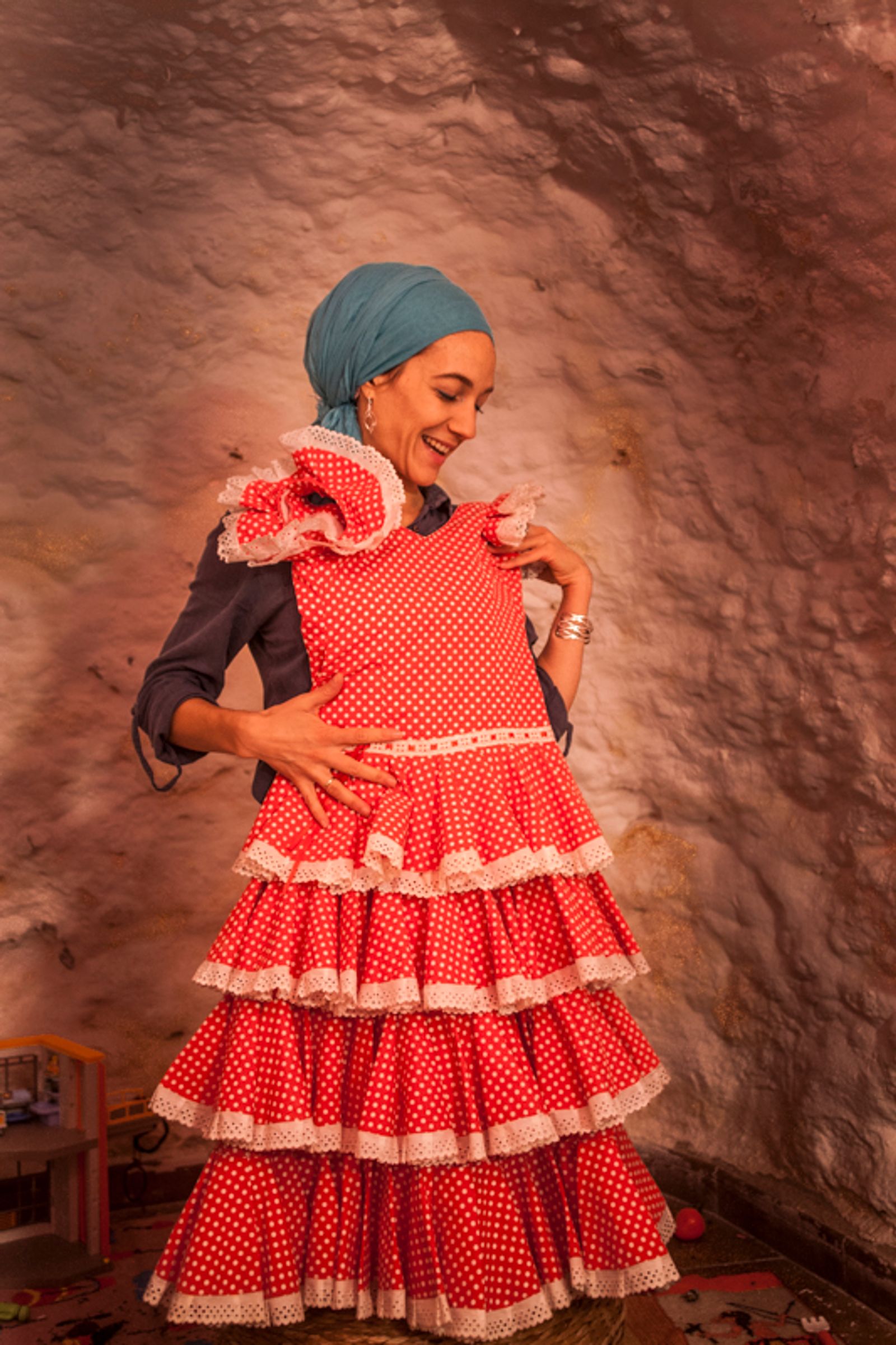 © Chiara Ferronato - Zahara playing with her daughter’s flamenco dress in her parents’ "casa cueva".