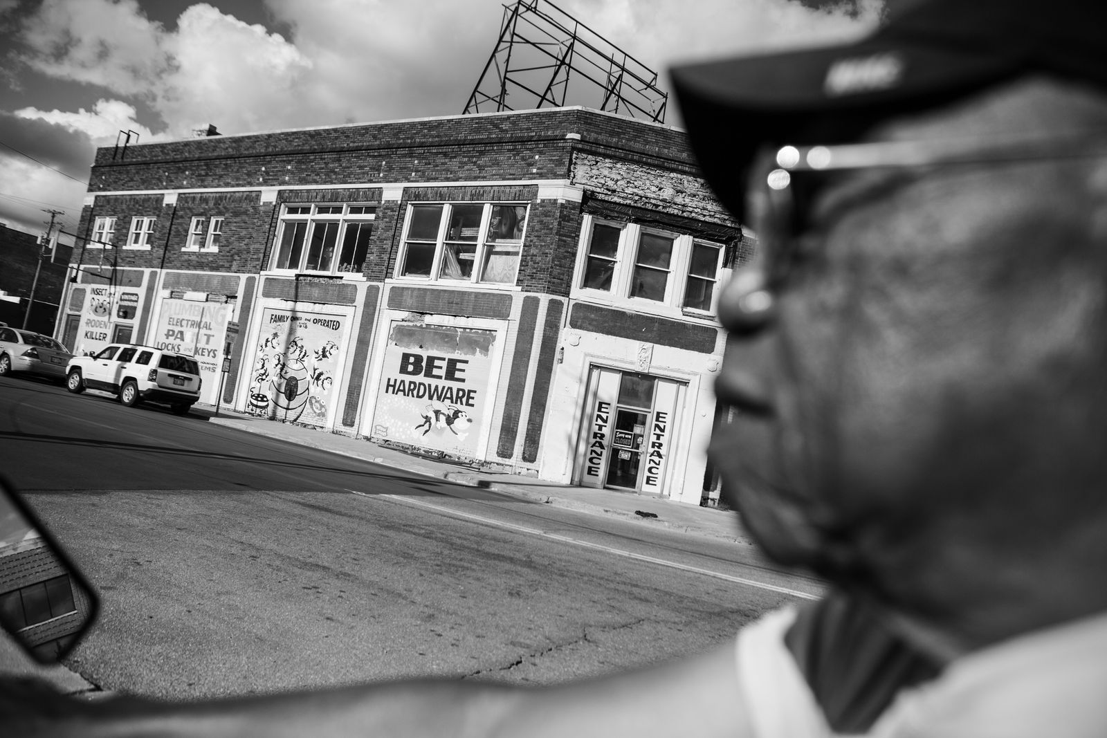 © JANICE MILHEM - Lee riding his motorized scooter through Detroit's Eastern Market.