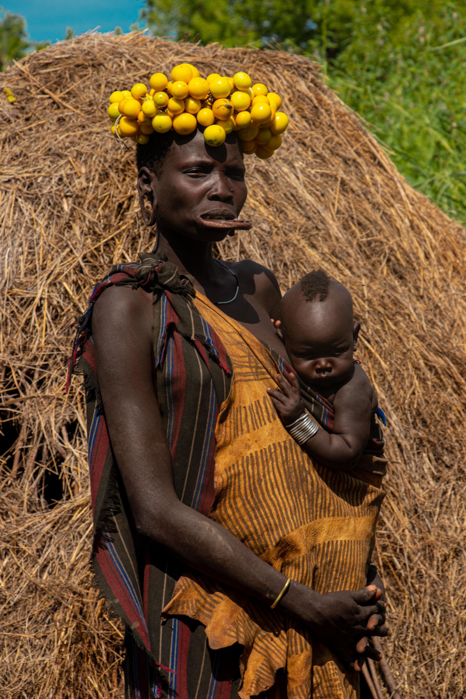 © Nwando Ebeledike - Mother and child in Mursi Tribe, Omo Valley, Ethiopia