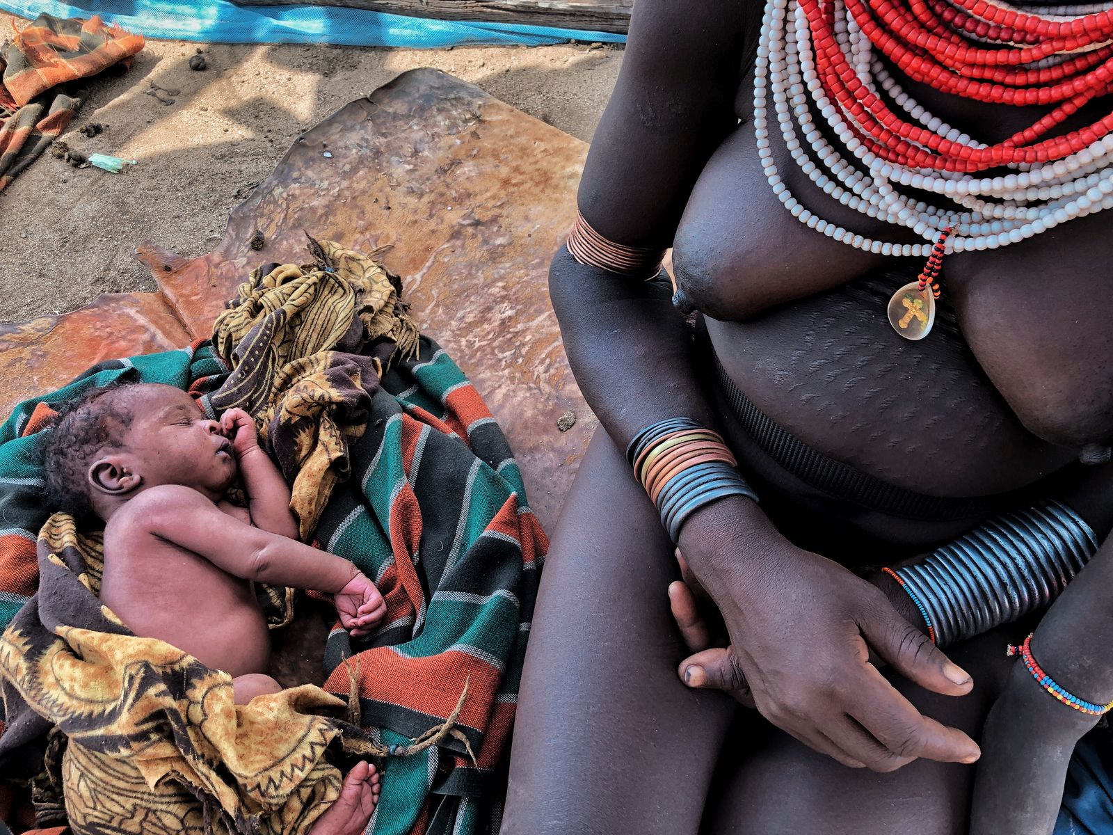 © Nwando Ebeledike - This photo was taken in Omo Valley, Ethiopia and is a photo of a mother and her day old child