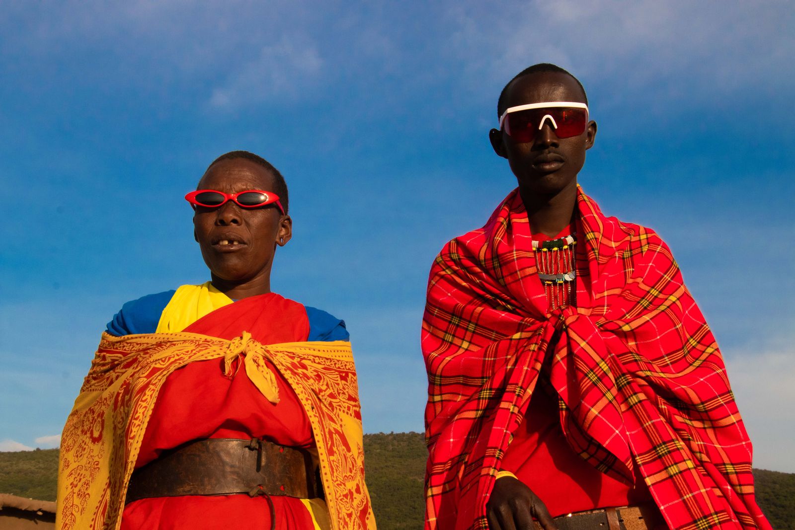 © Nwando Ebeledike - This photo was taken in Maasai Mara, Kenya and is a photo of two Maasai's in the same community