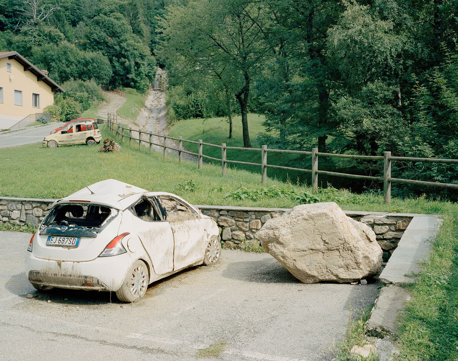 © Nicolò Panzeri & Mattia Micheli - Detail of a car hit by the landslide that devastated the village of Casargo. Casargo, Italy, 2019.