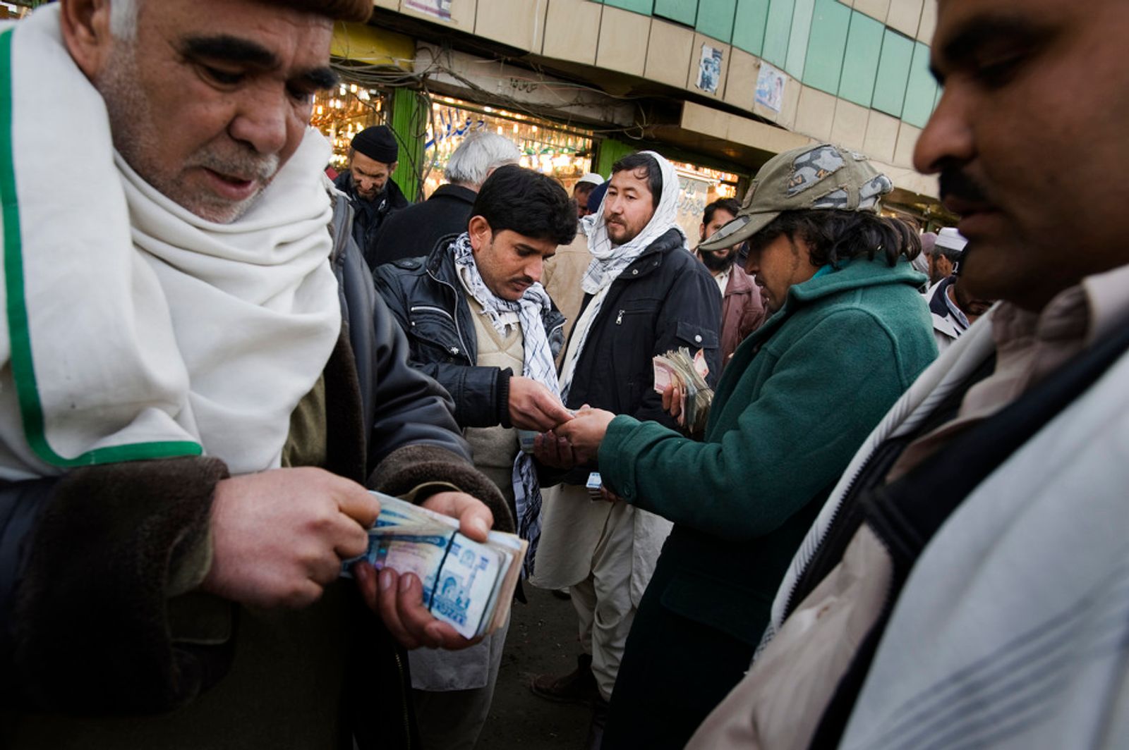 © Daniel Pilar - Money exchange on a street in the downtown of Kabul on january 30th 2010.