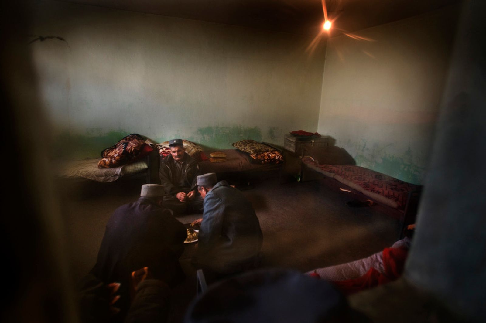 © Daniel Pilar - View inside the staffroom of the prison guards in the central prison of Kabul on january 30th 2010.