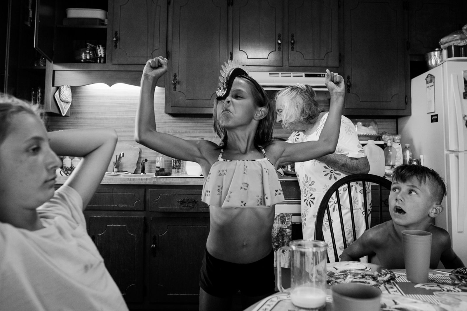 © Angela Ramsey - Rose, my feminist daughter, shows her strength at dinner with grandma.